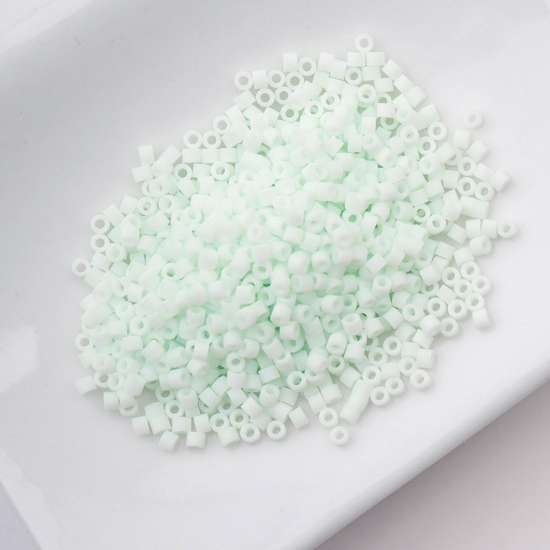 John Bead Cylin 11/0 Matte Macaron Cylindrical Seed Beads - Pale Seafoam sitting in dish