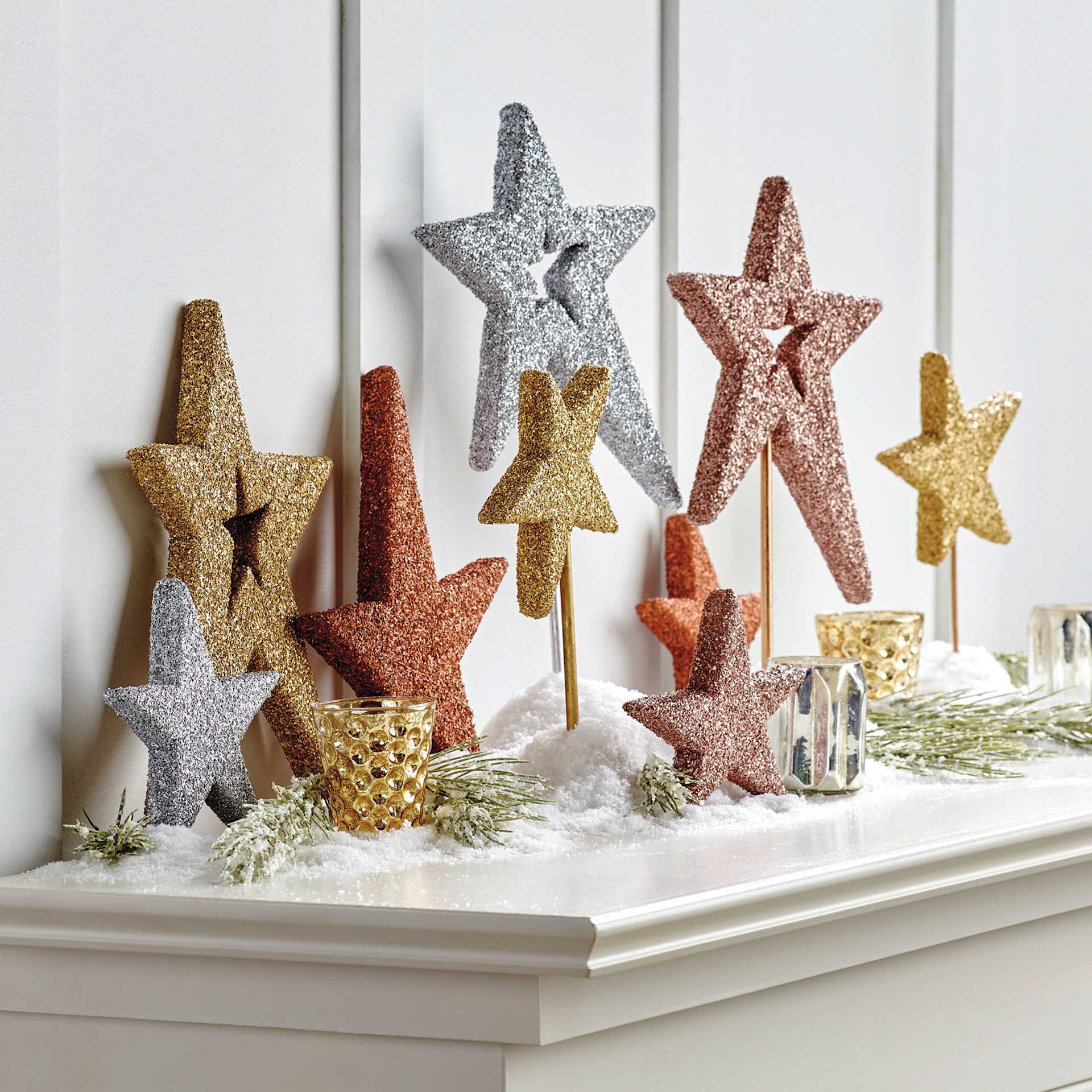 FloraCraft Diamond Dust Crushed Glass Glitter applied to star decorations