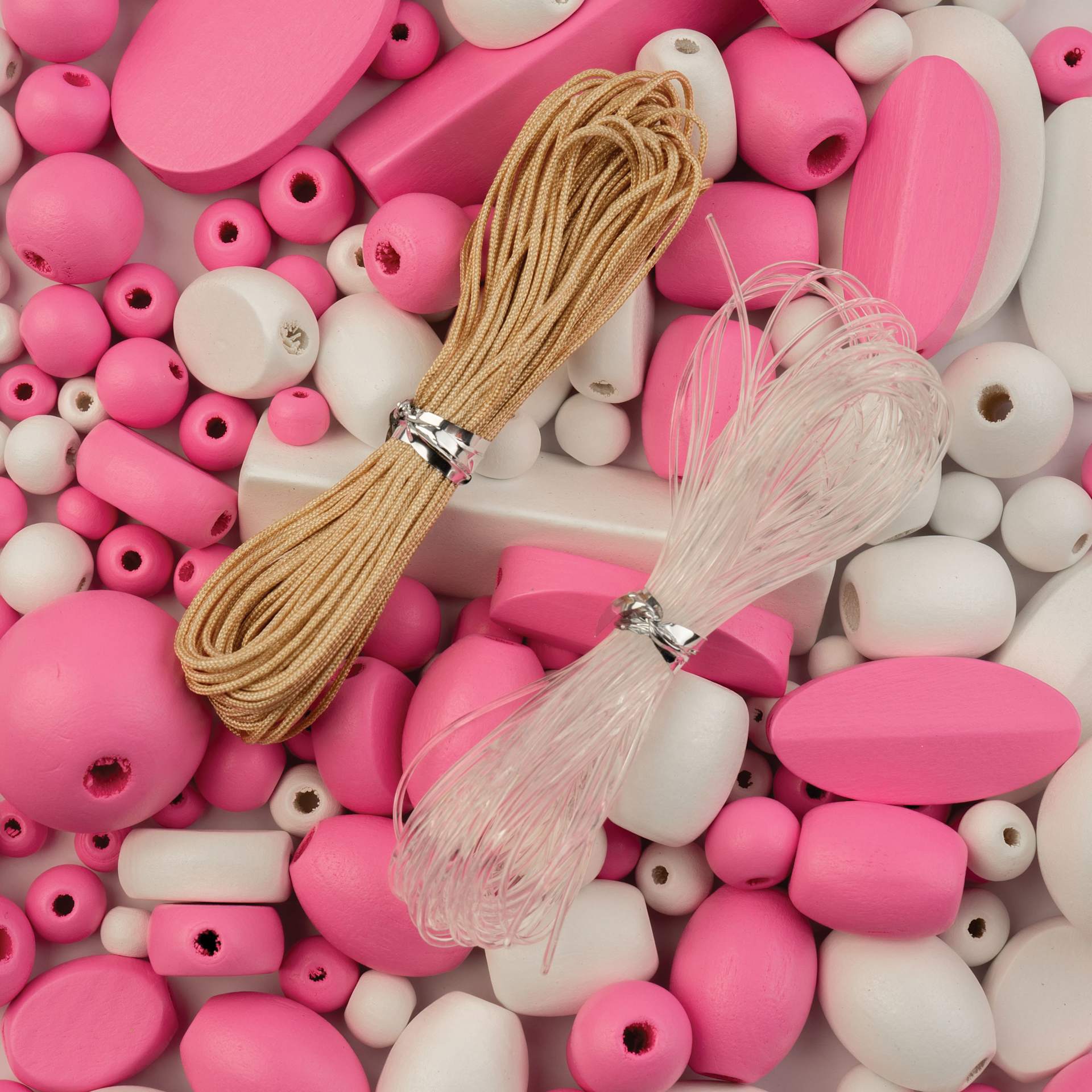 John Bead Wood Craft Beads - Pink and White, 90 g Bag showing included nylon cords