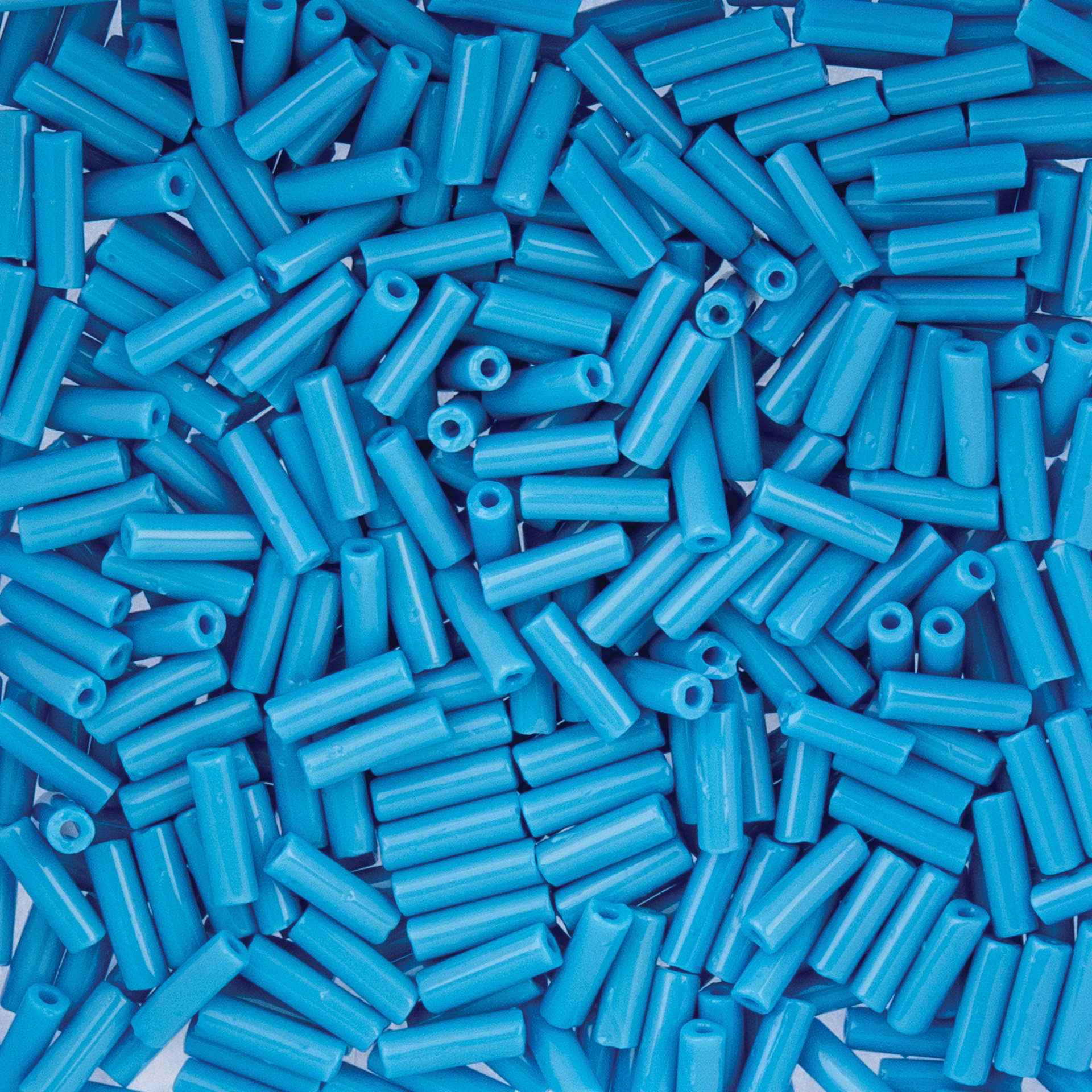 John Bead Czech Glass #3 Bugle Beads - Opaque Medium Blue close up