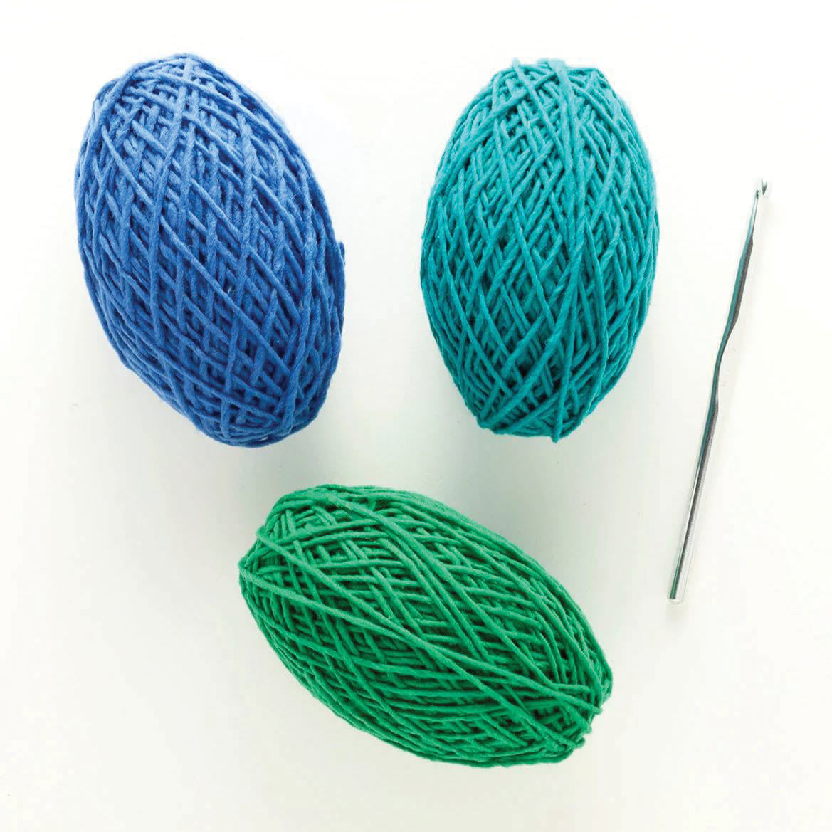 Friendly Loom Discover Crochet Scarf Kit - Ocean showing included crochet hook with yarn