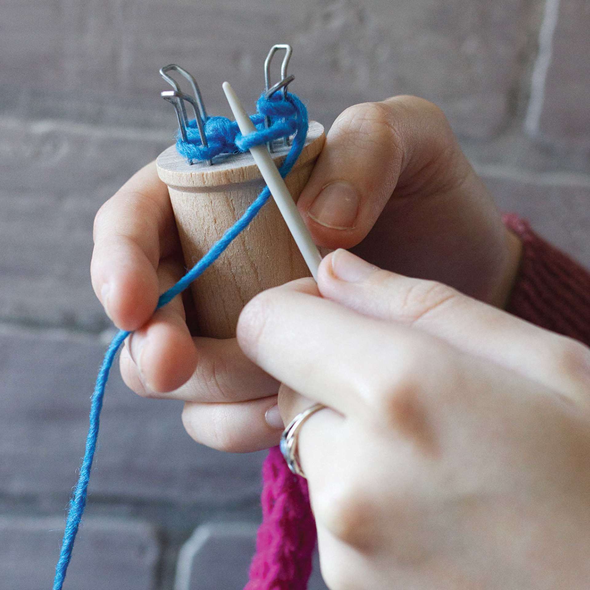 Friendly Loom Discover Knitting Spool Kit showing project being created on spool knitter