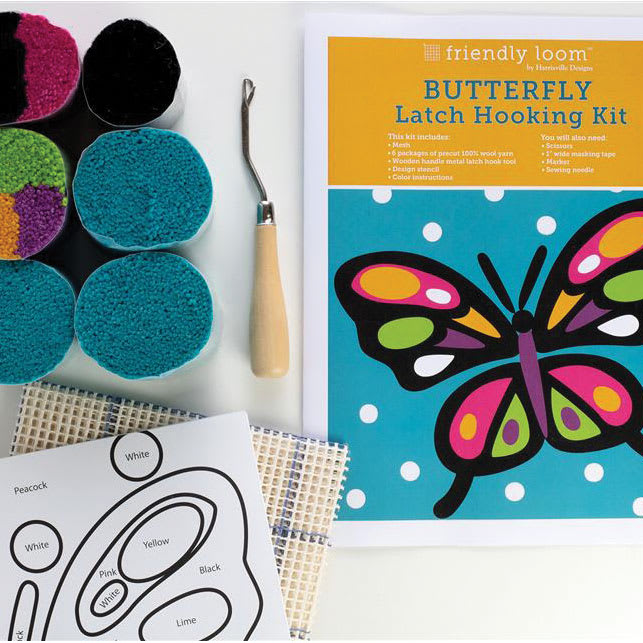 Friendly Loom Discover Latch Hooking Kit - Butterfly contents laying on table