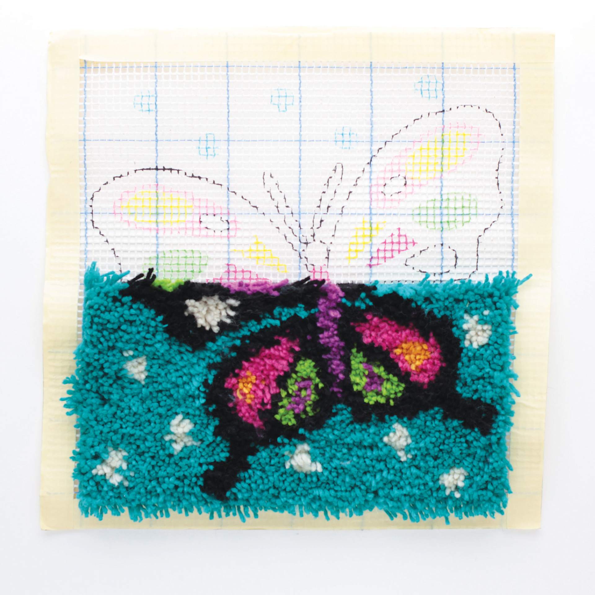 Friendly Loom Discover Latch Hooking Kit - Butterfly halfway completed project