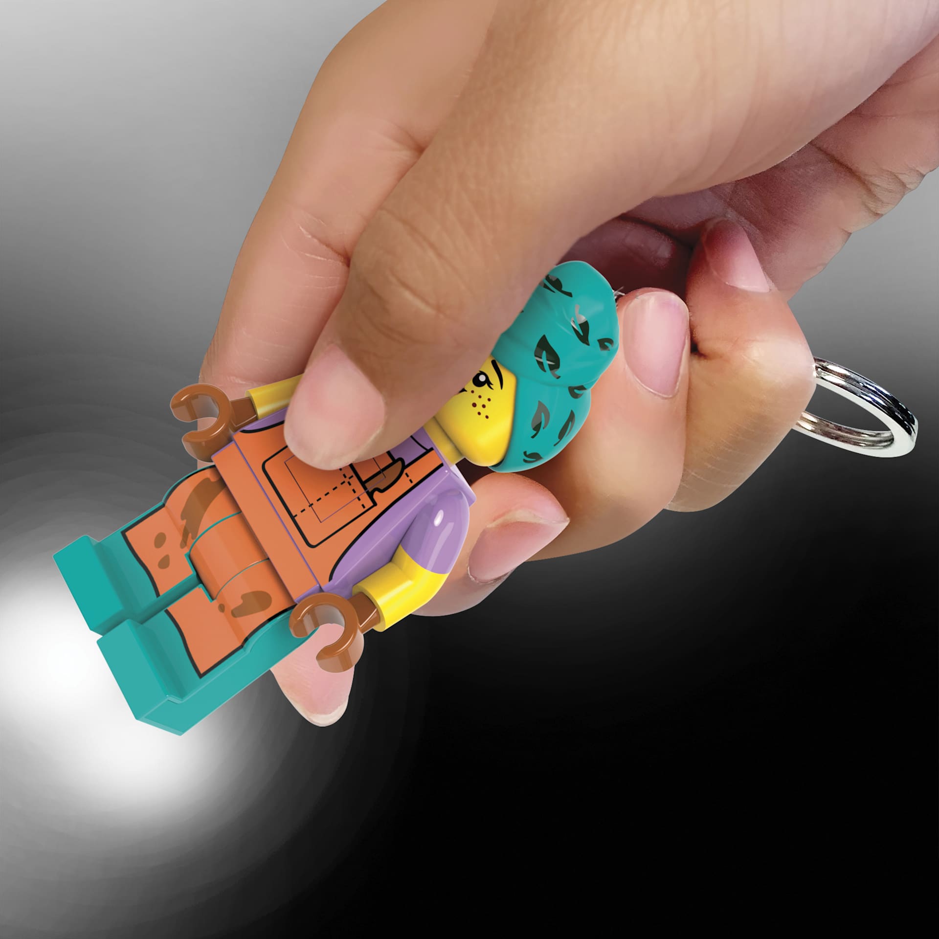 LEGO Iconic Ceramics Girl Keychain Light, LED light turned on