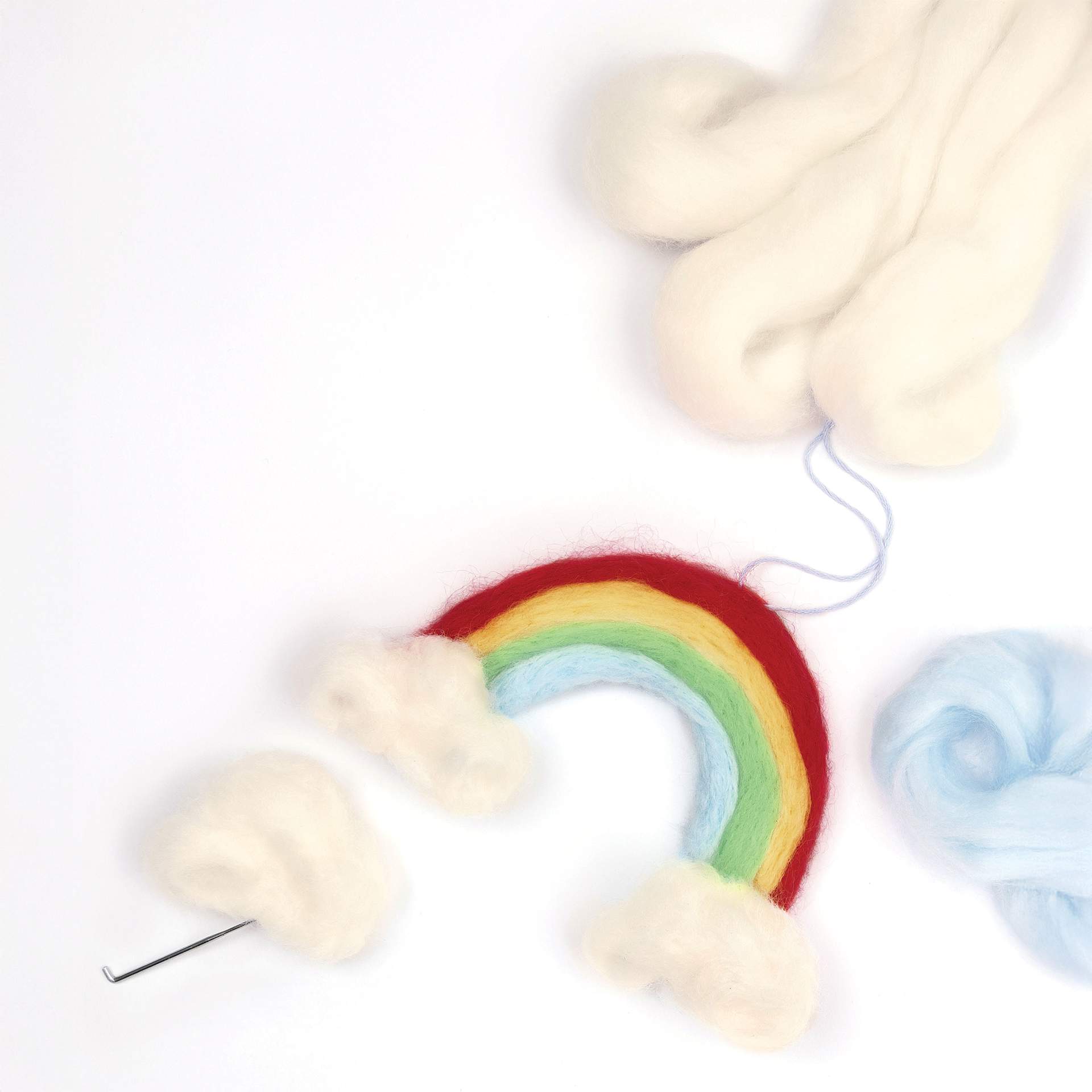 Folia Rainbow Felting Wool - Set of 12 Colors, 350 g showing completed rainbow project