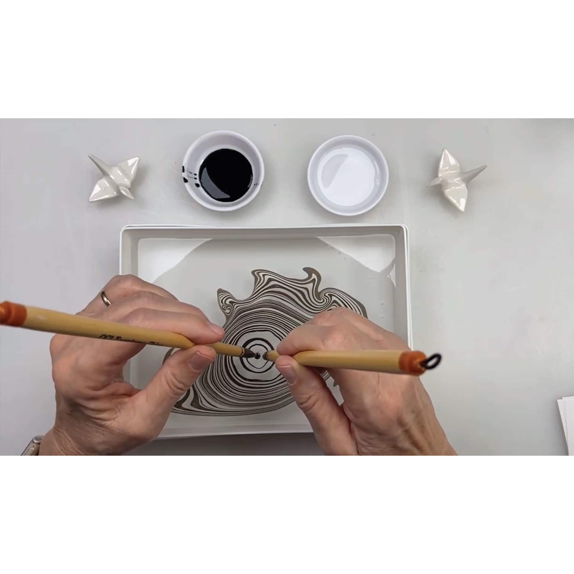 Yasutomo Suminagashi Kit, applying ink to water surface