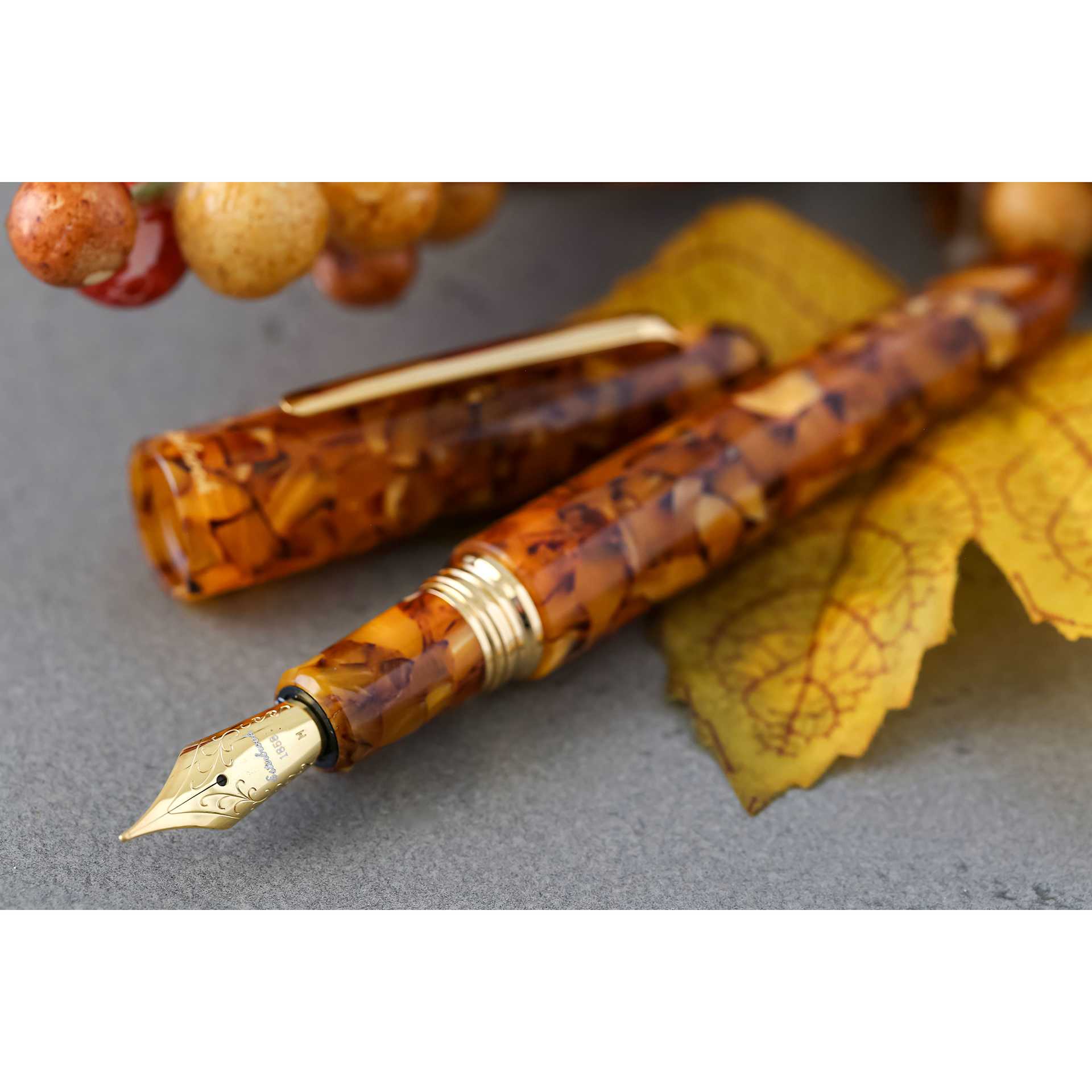 Esterbrook Estie Fountain Pen - Honeycomb, Medium Nib, close up with autumn foliage