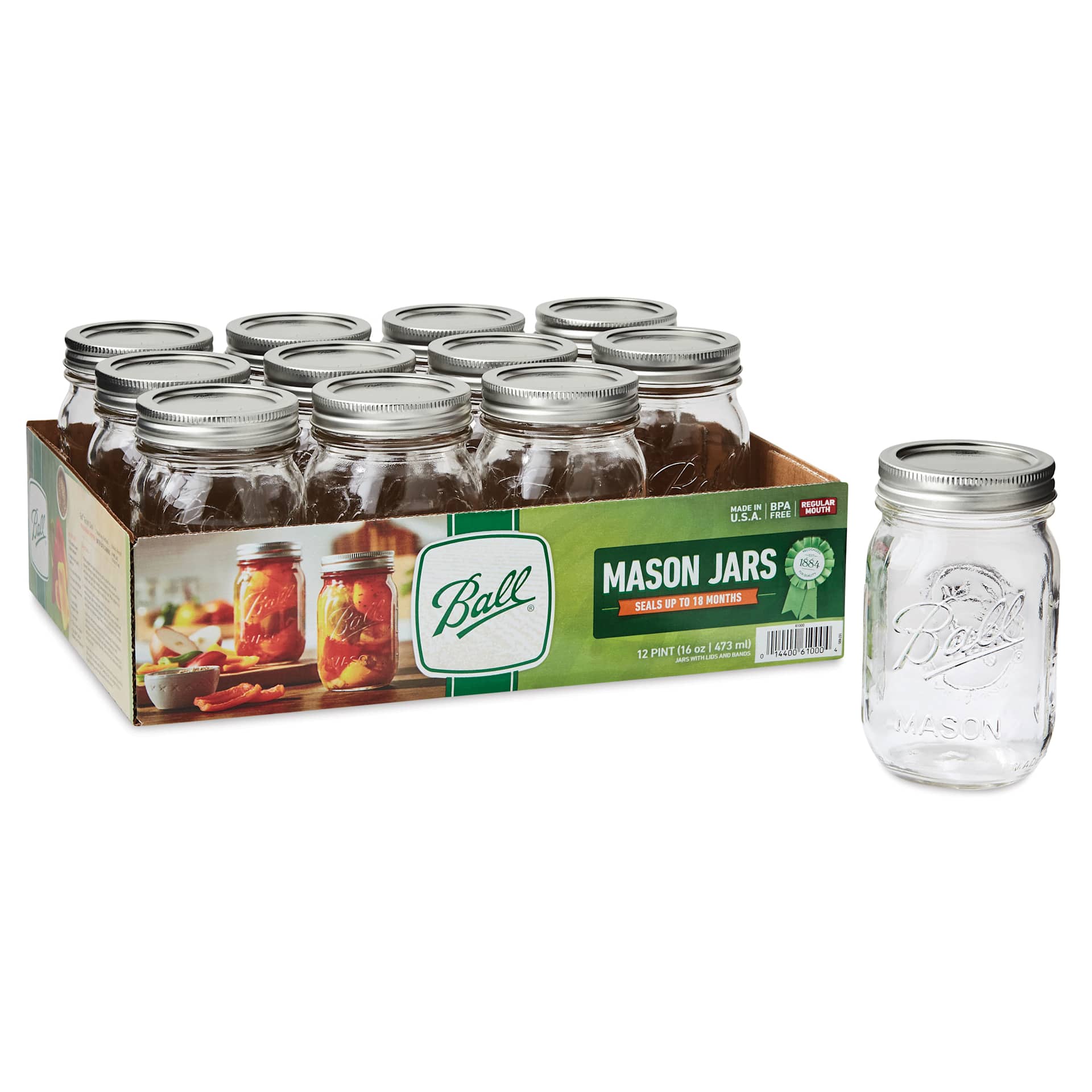 Ball Mason Jars and Lids - 16 oz, Regular Mouth, Pkg of 12, one jar in front of packaging