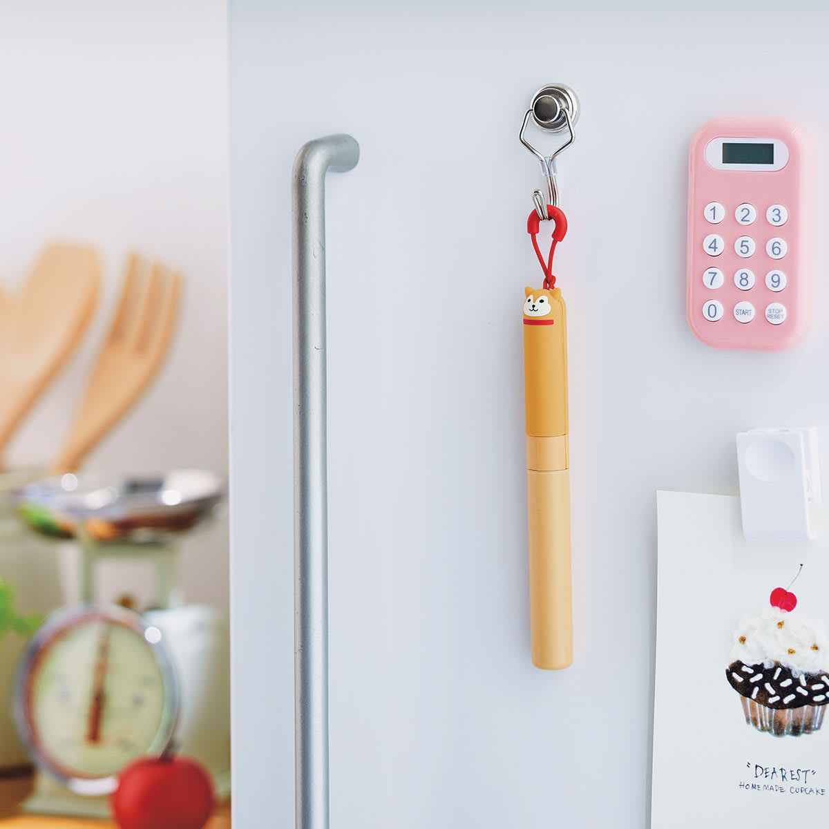 PuniLabo Stick Scissors - Shiba Dog (hanging from a hook on a cabinet)