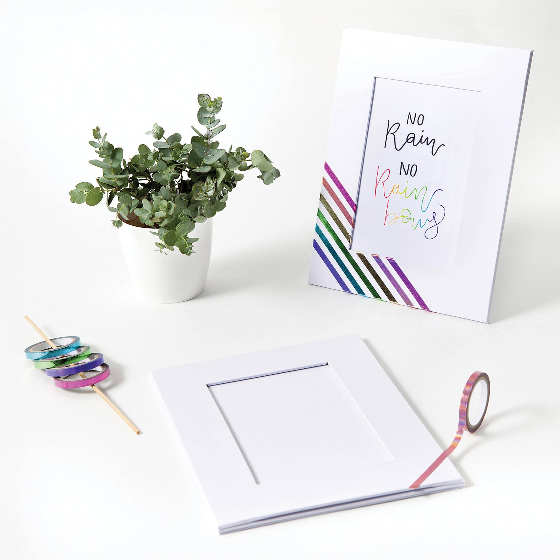 Folia Cardboard Picture Frames - Set of 2, Rectangular, 10 cm x 15 cm showing two in progress projects with decorative tape