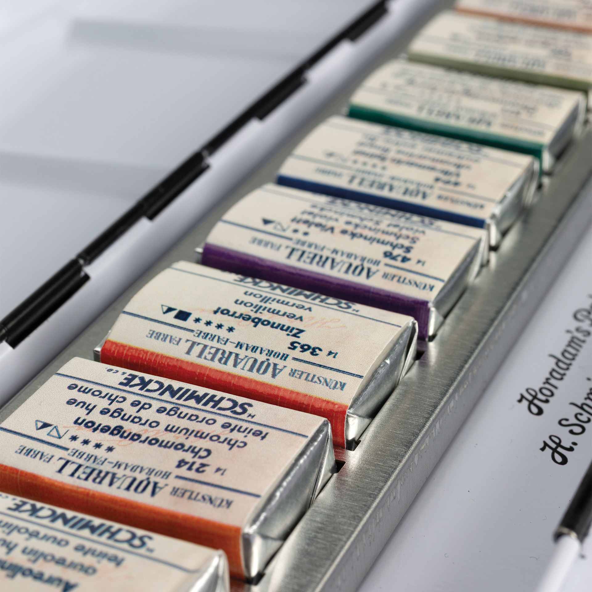 Schmincke Horadam Aquarell Watercolor Pans - Set of 9, Technical Colors, close-up of the full pans
