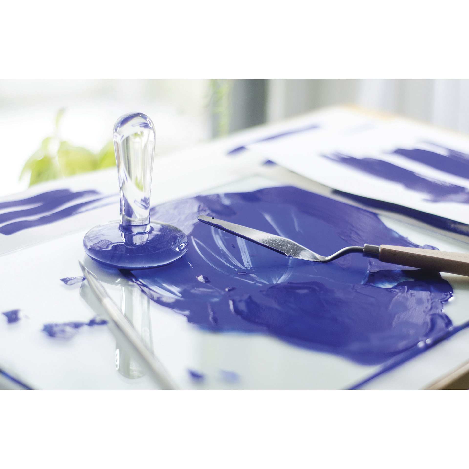 Natural Earth Paint Natural Watercolor Kit - blue paint spread on a palette alongside a palette knife