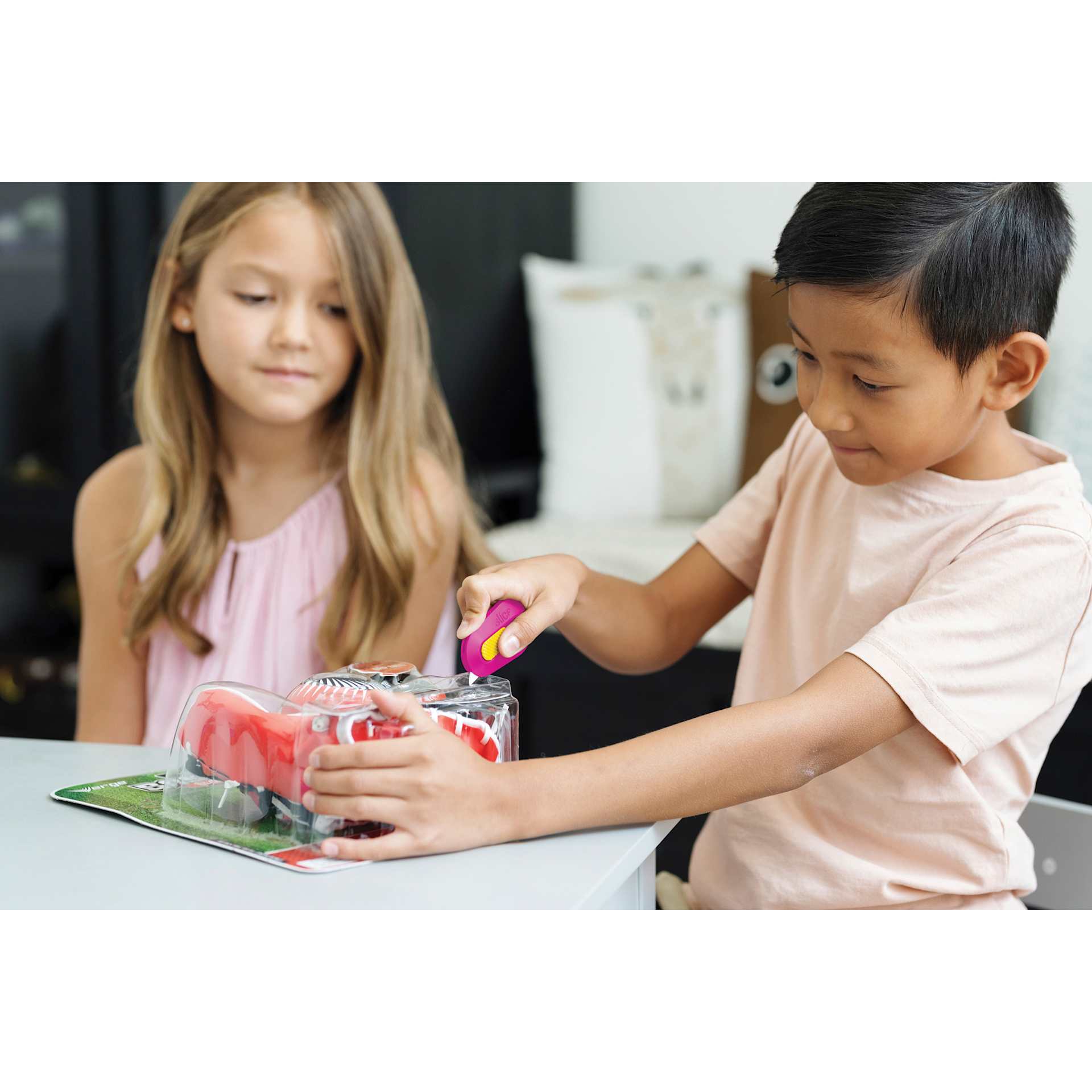 Slice Mini Cutter - Fuschia - in use by child