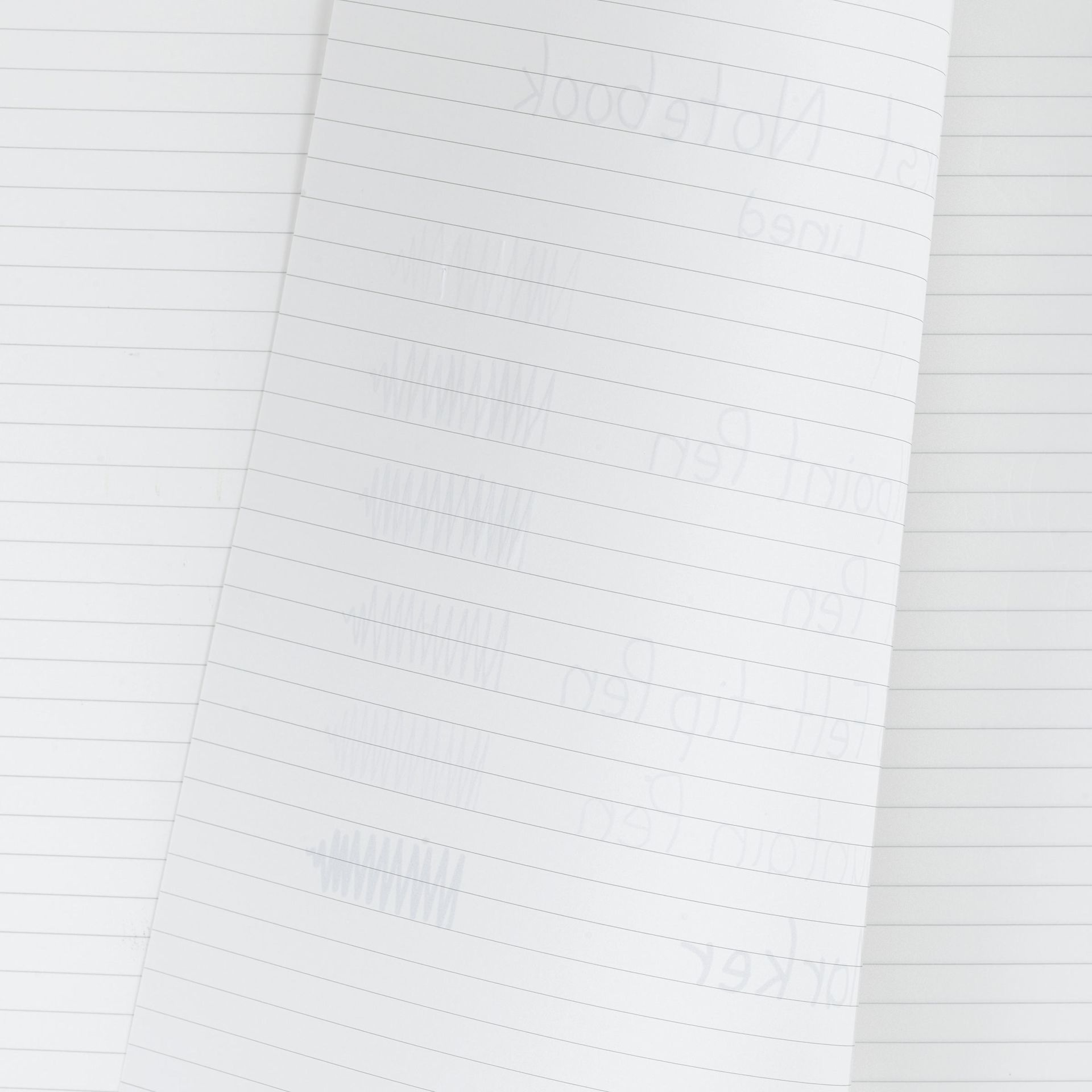 Karst Stone Paper Notebooks, bleed of pen marks on lined paper