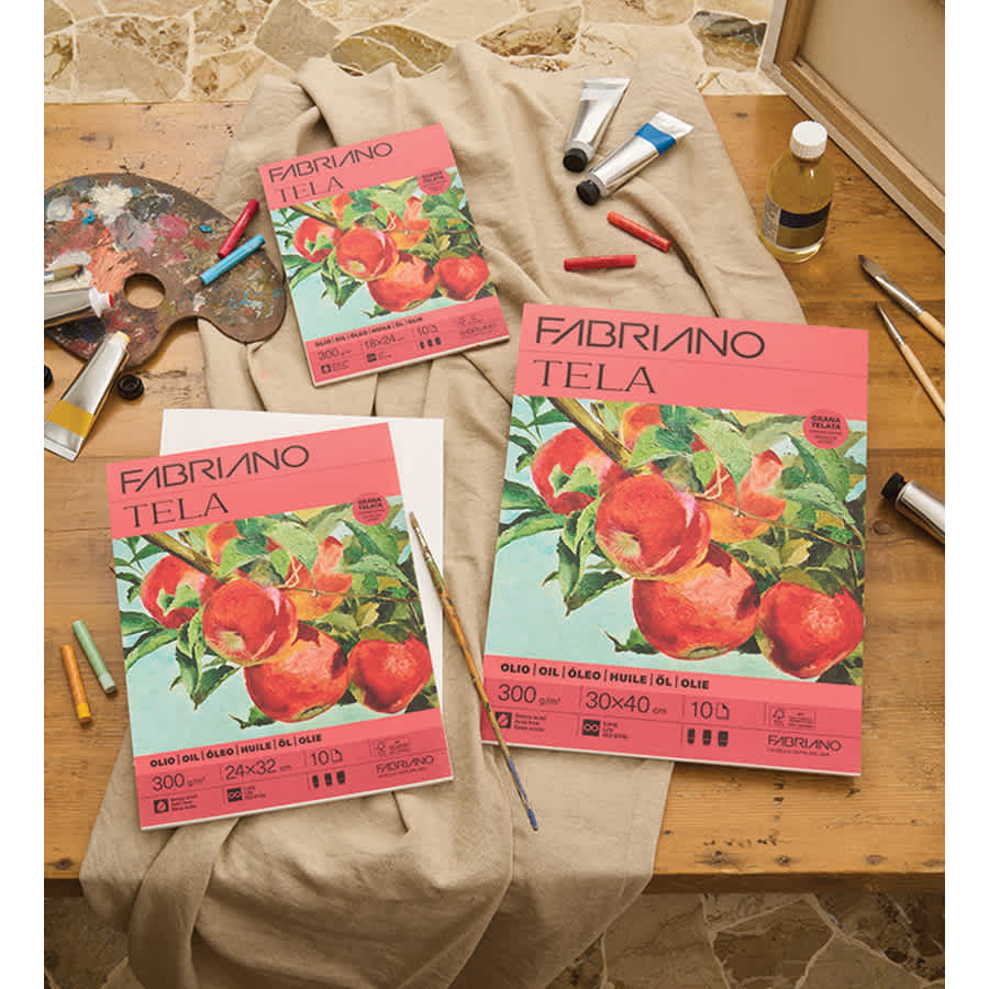 Fabriano Tela Oil Painting Pads, on table with oil paints and brushes