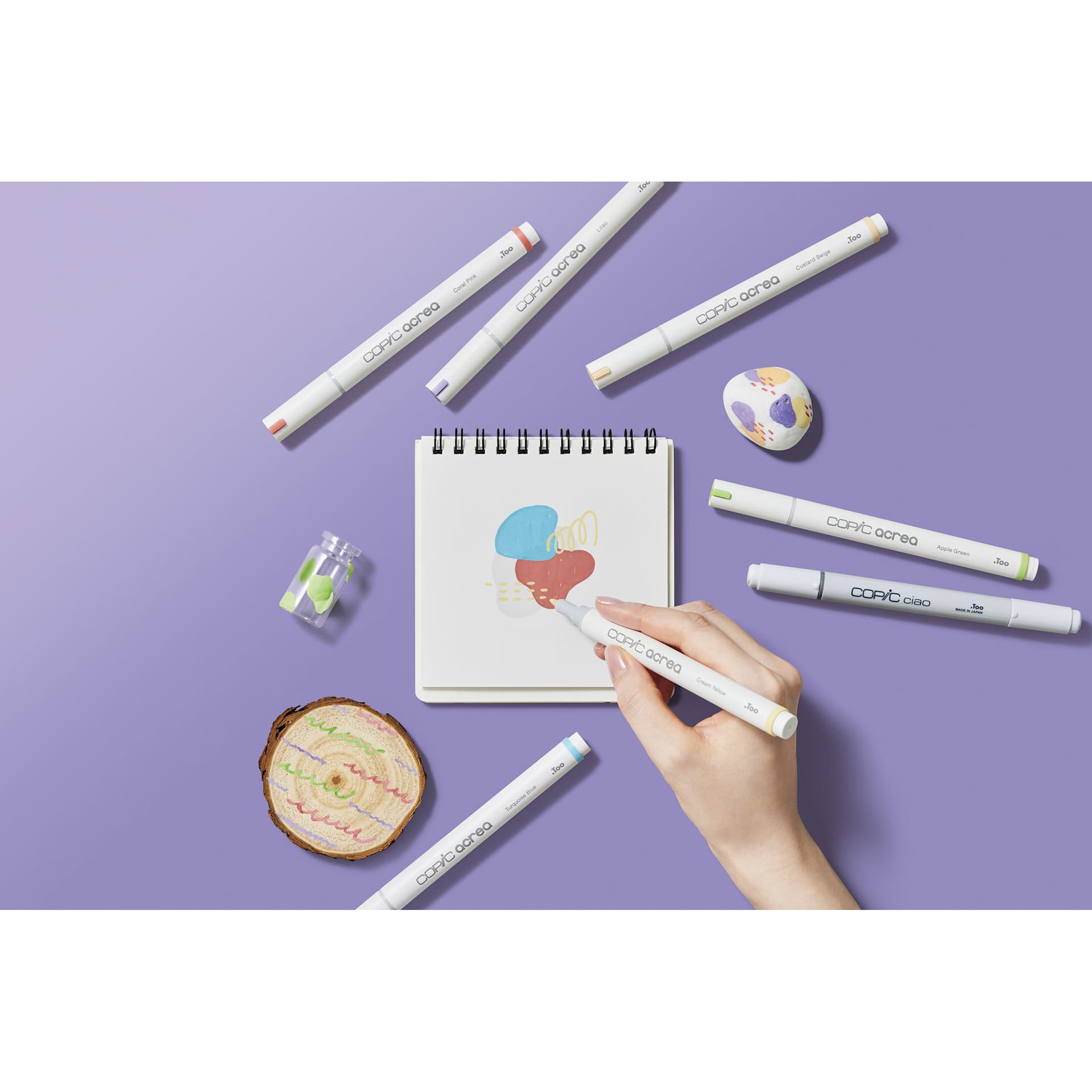 Copic Acrea Paint Markers - Light Colors, Set of 6, marker in hand coloring a drawing
