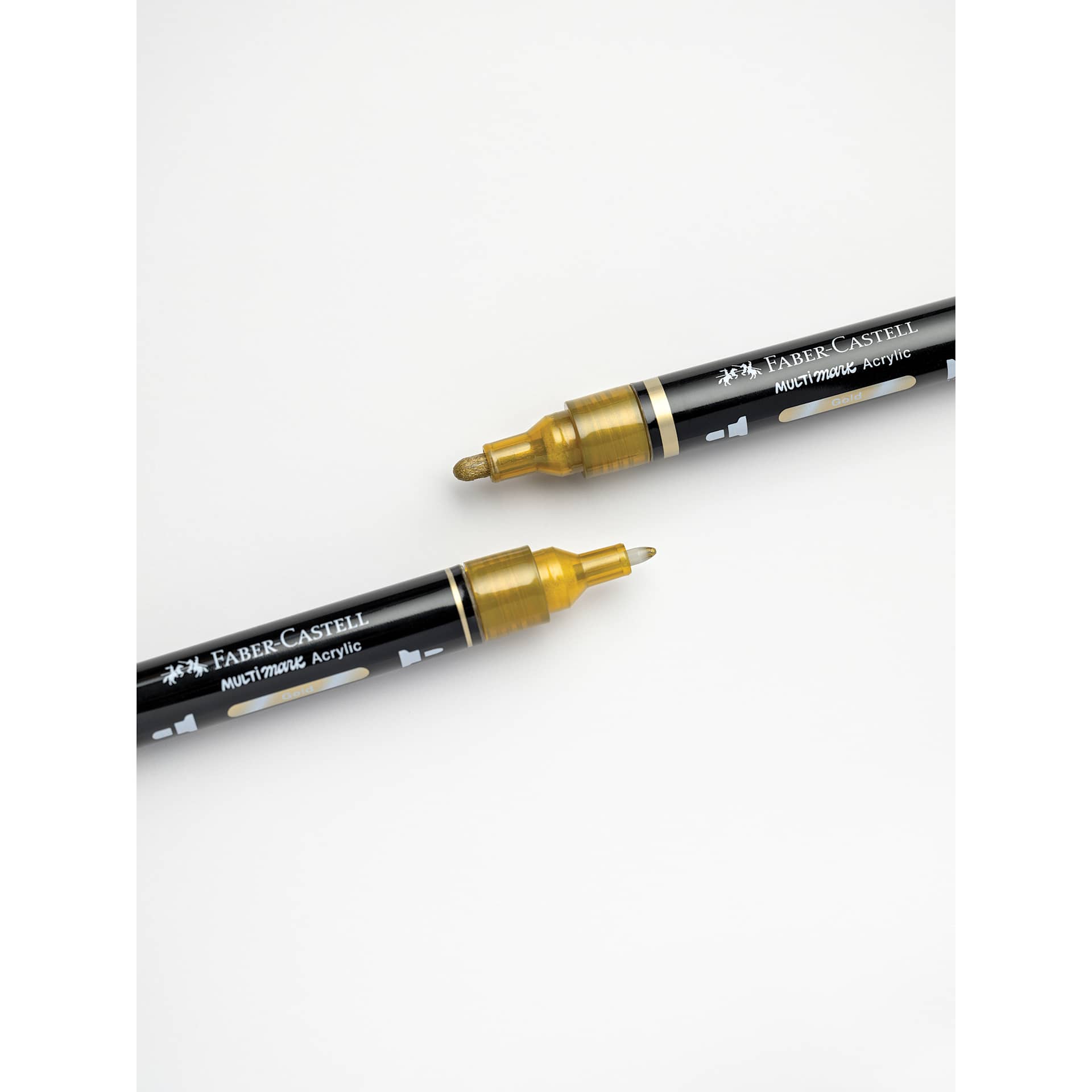Faber-Castell Multimark Dual-Tip Acrylic Marker - Gold, the 1-2mm and 2-3mm tips shown together.