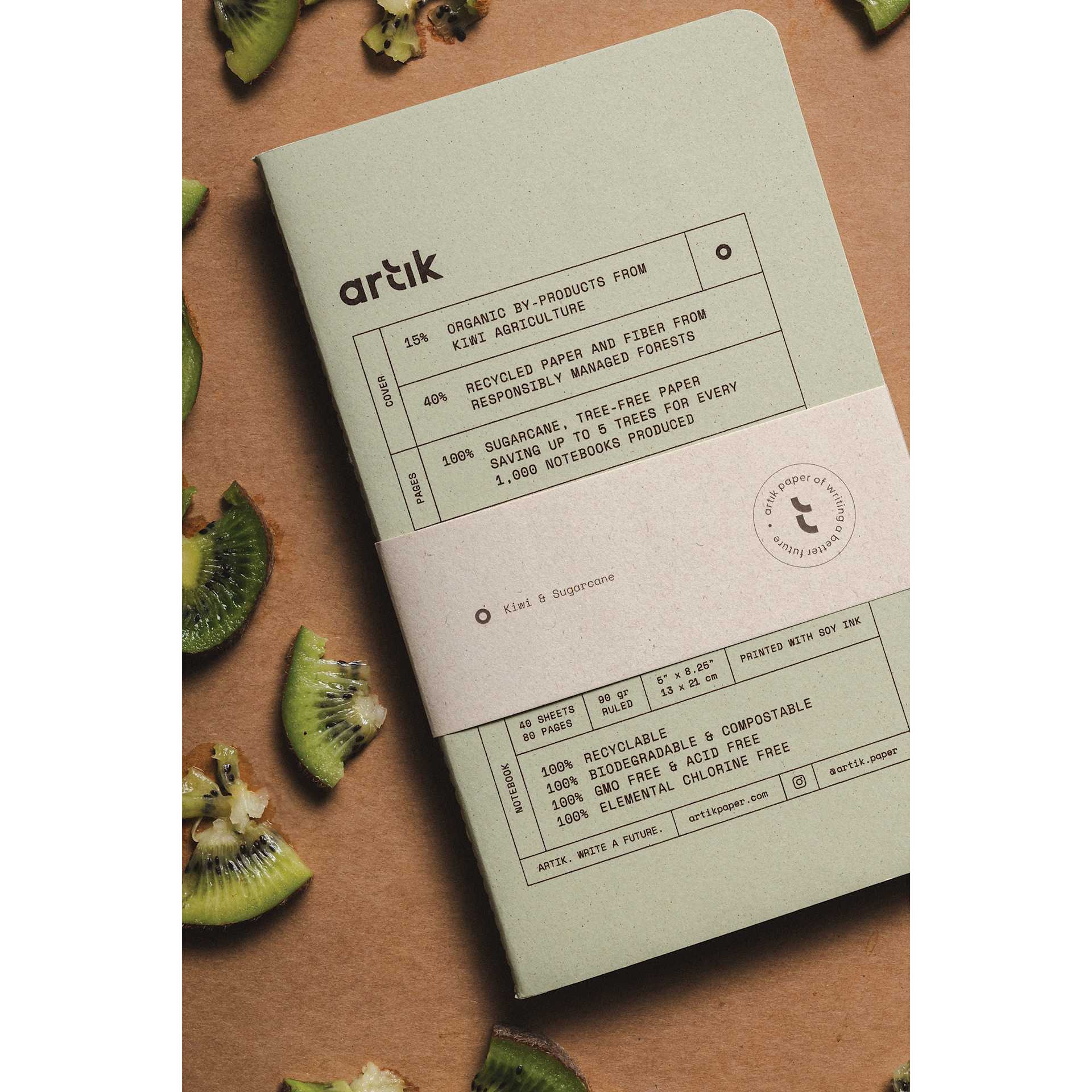 Artik Singer Sewn Notebook - Kiwi, 5" x 8-1/4", Ruled, Pkg of 2, on table