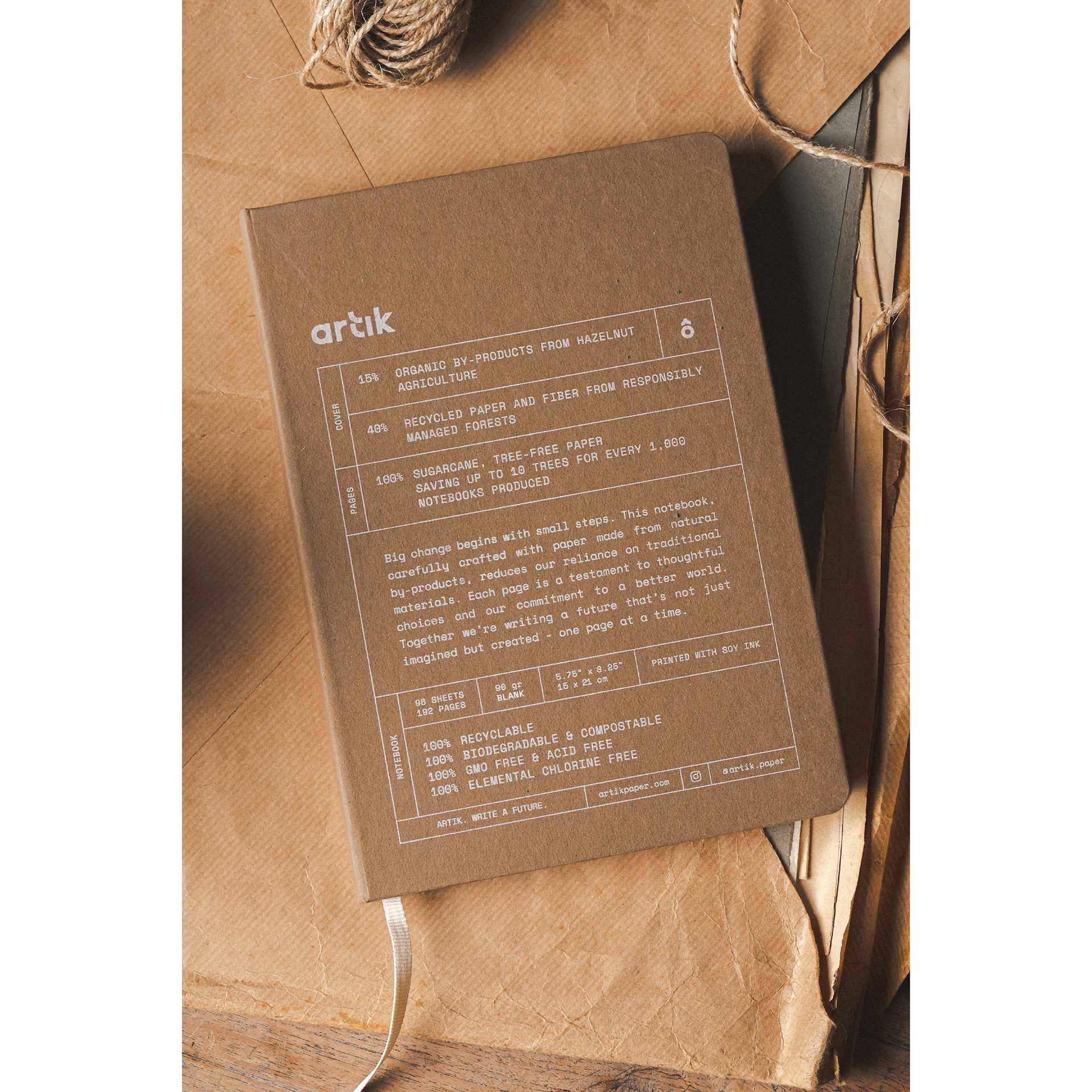 Artik Hardcover Notebook - Hazelnut, 5-3/4" x 8-1/4", Blank, on desk