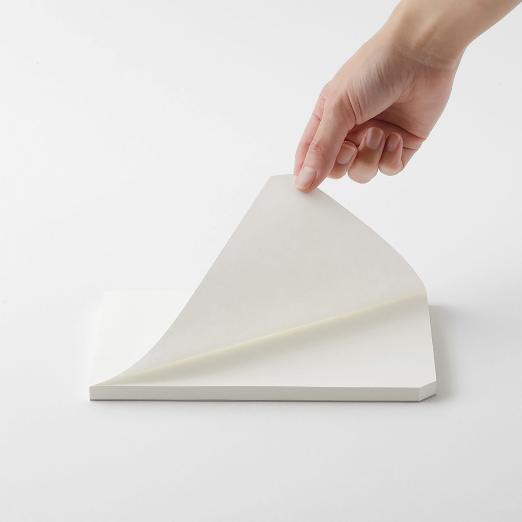 Midori MD Cotton Paper Pad - A5, Blank, White, 90 Sheets, sheet being lifted