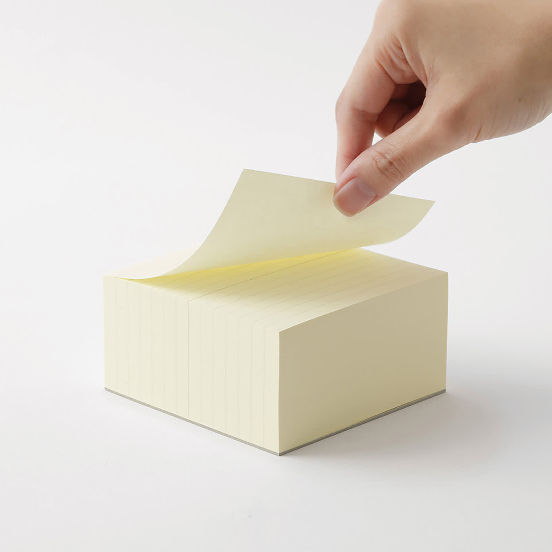 Midori MD Memo Block - 3.9" x 3.9", Lined, White, sheet being lifted