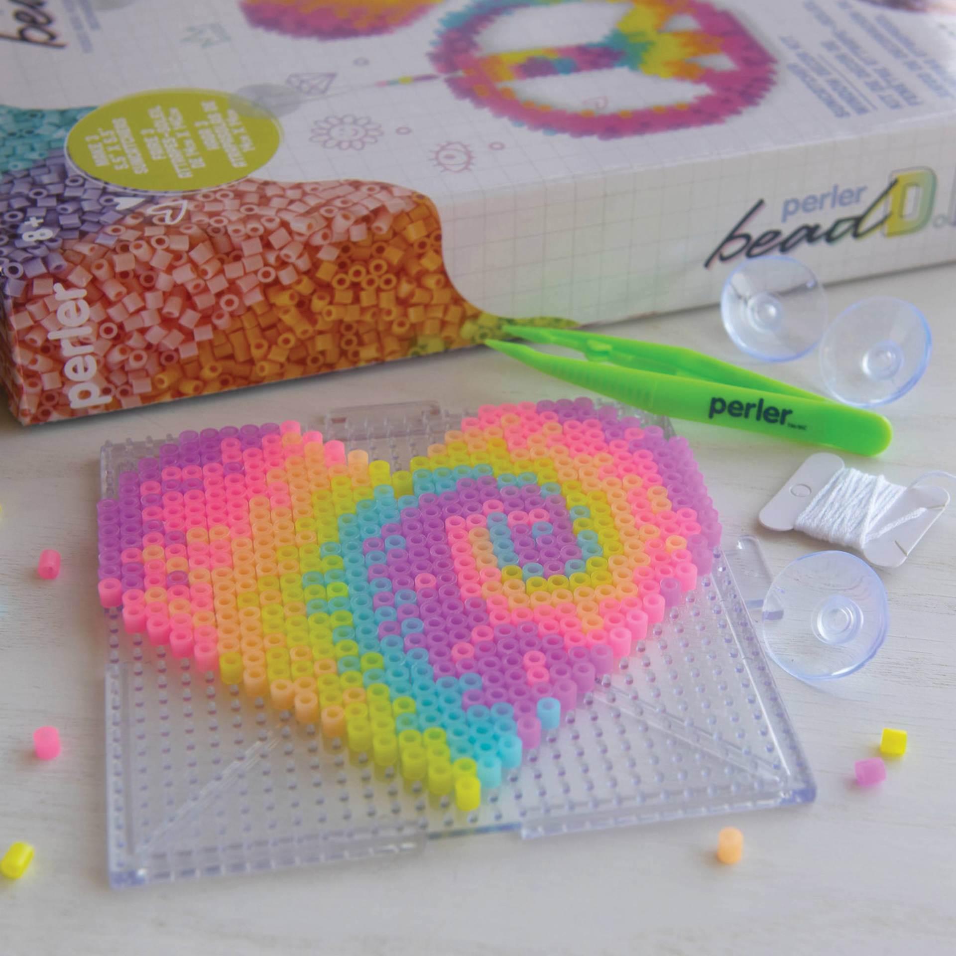Perler Bead D.I.Y. Tie Dye Suncatcher Activity Kit finished suncatcher example
