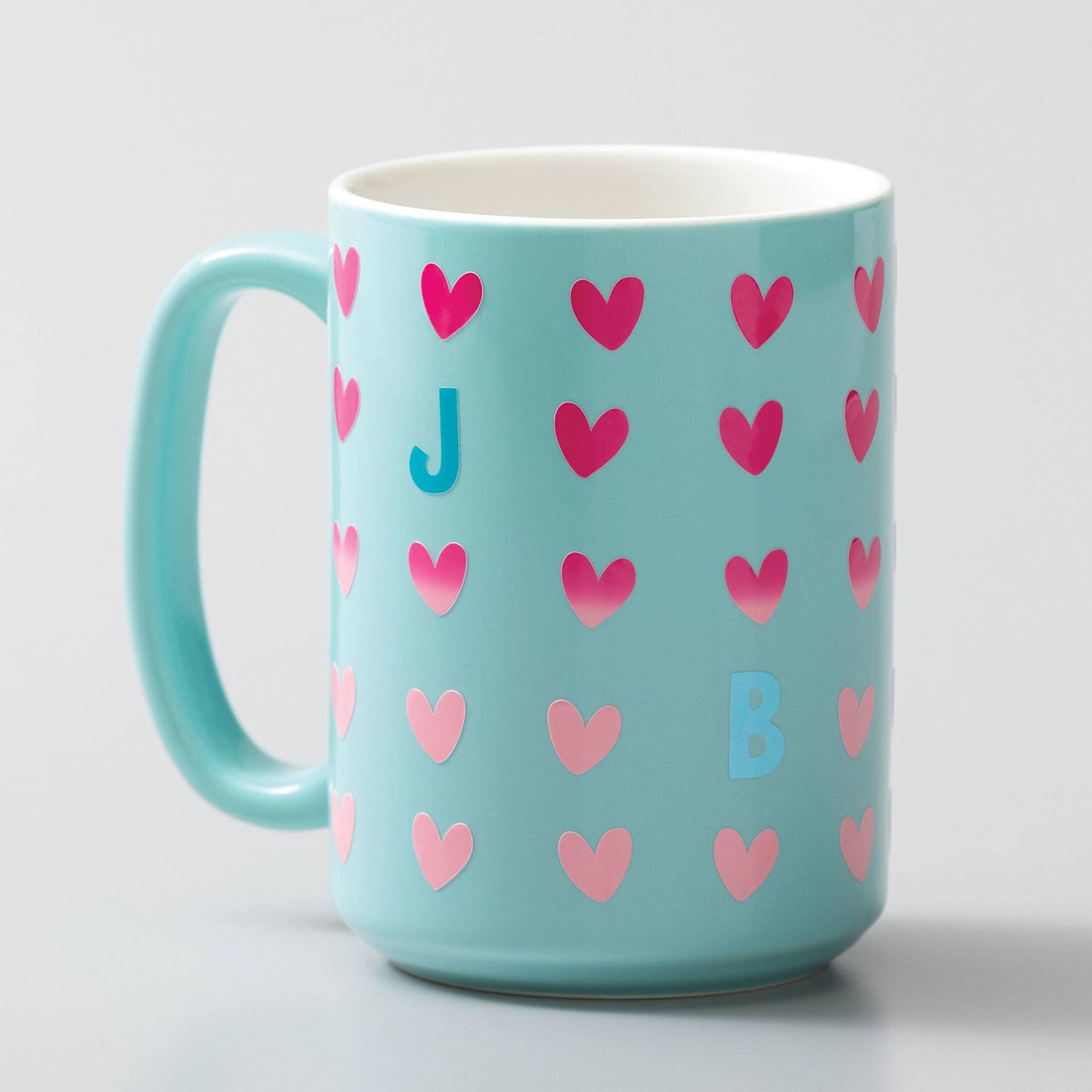 Cricut Heat Color-Changing Permanent Vinyl - Turquoise/Blue, 12" x 24" demonstrating color change, finished mug example