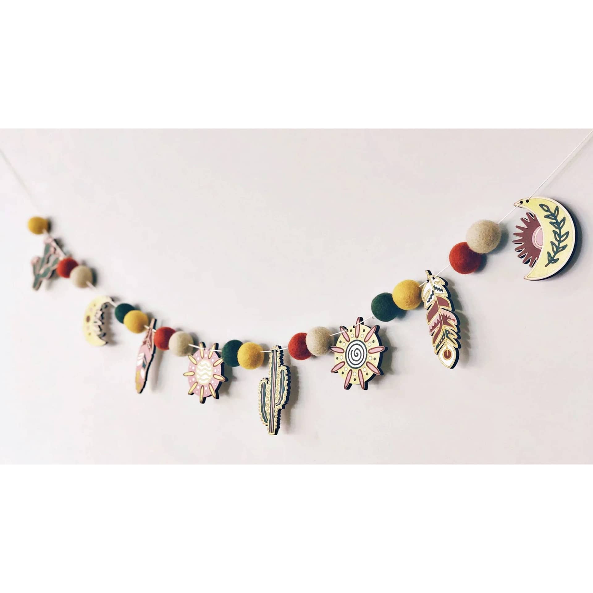 Woodsy Craft Co. DIY Garland Kit - Boho - finished garland example on wall