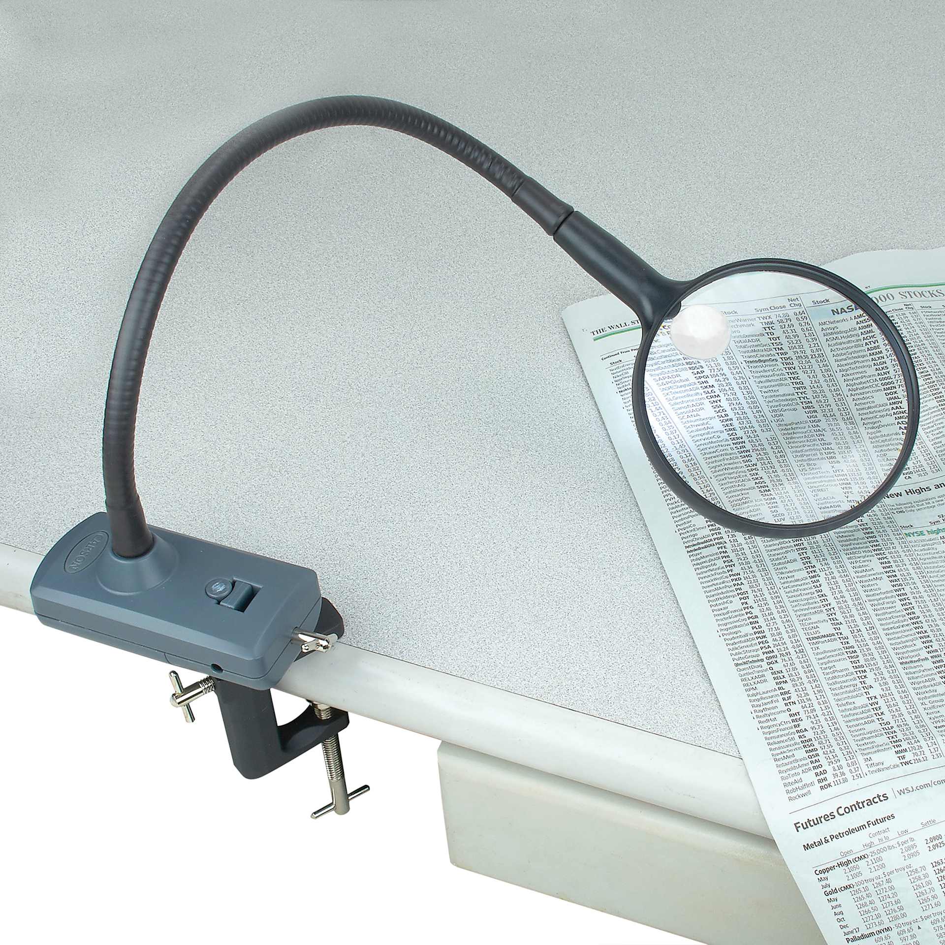 Carson MagniFlex LED Magnifier in use on table