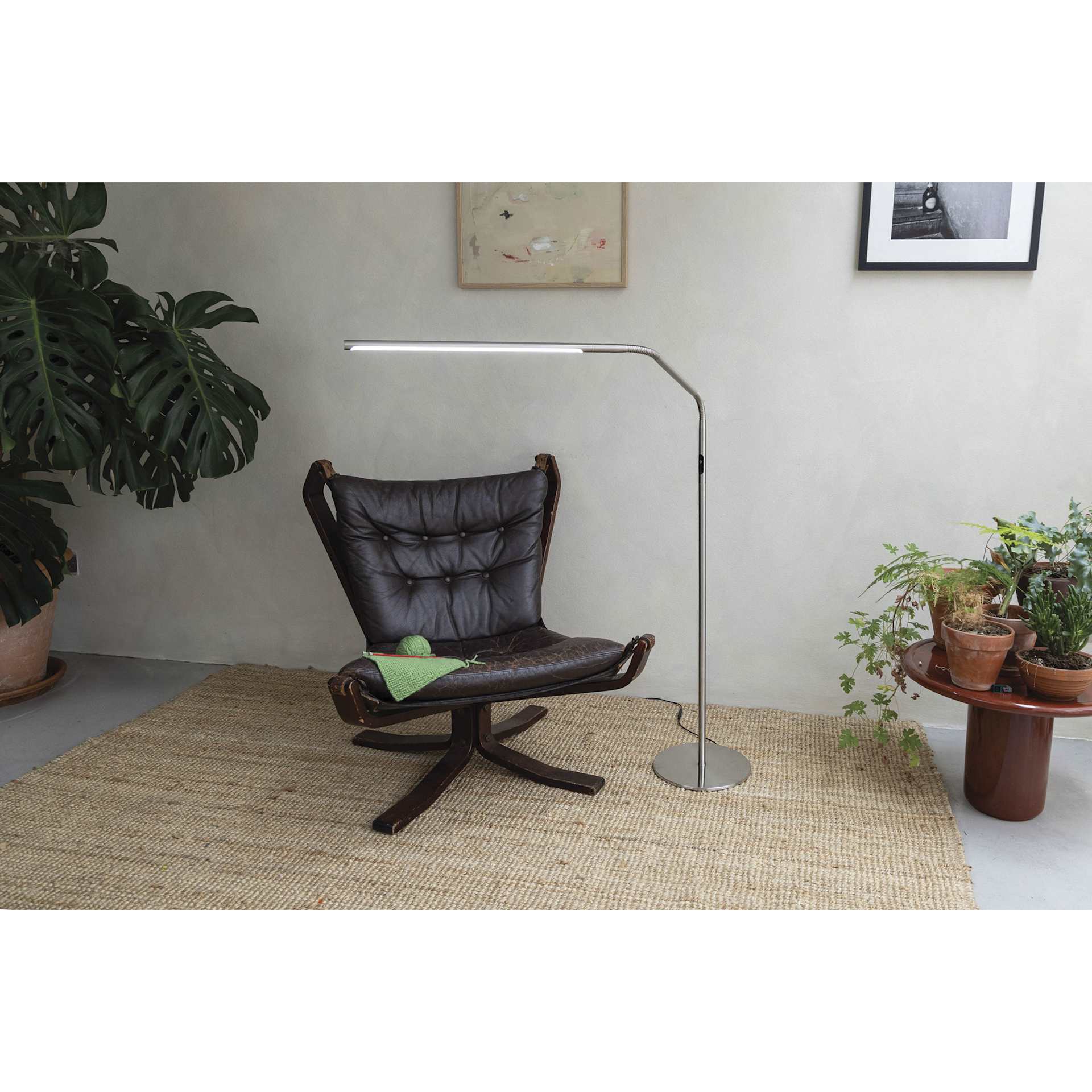 Daylight Slimline 4 LED Floor Lamp - Brushed Steel - in use over reading chair