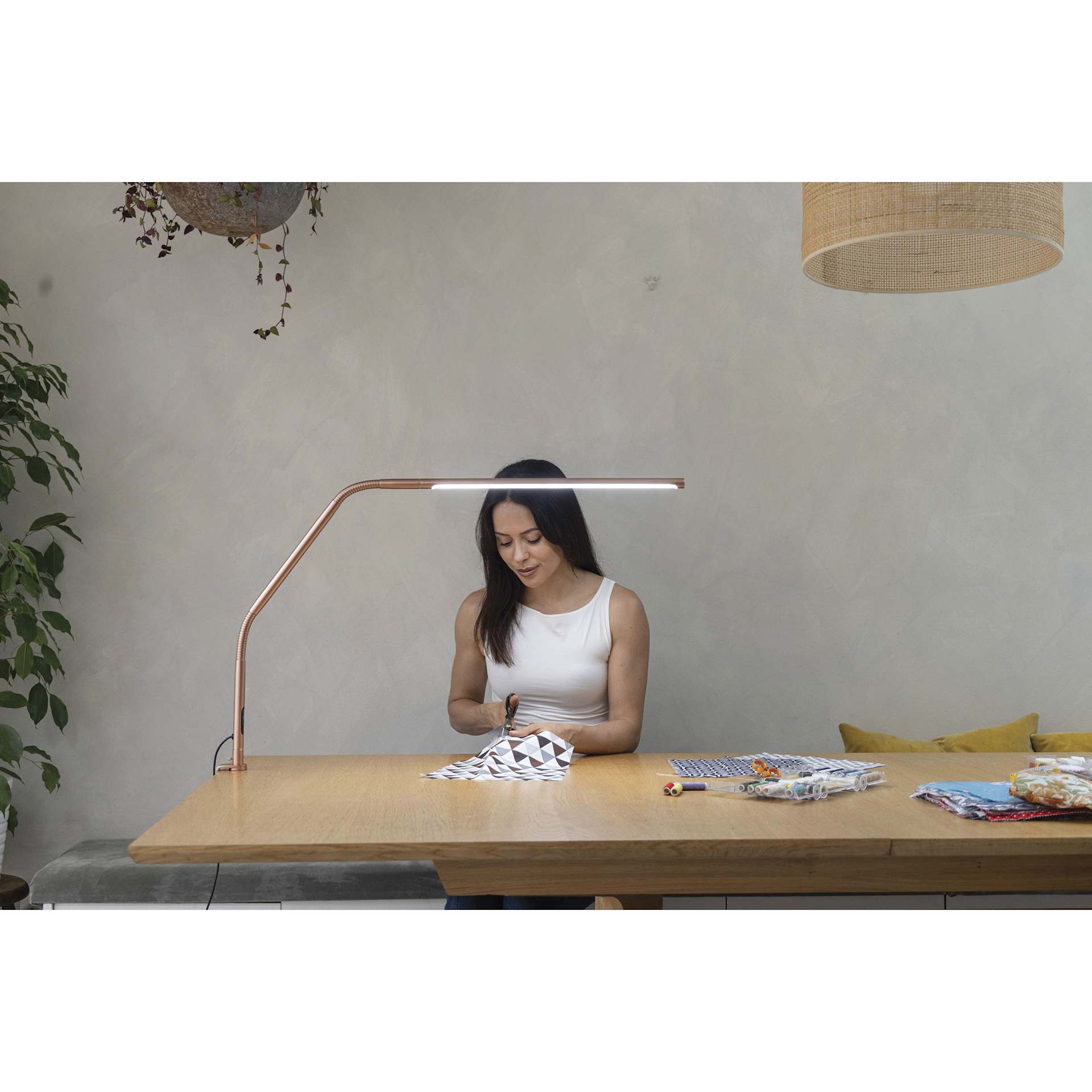 Daylight Slimline 4 LED Table Lamp - Rose Gold - in use