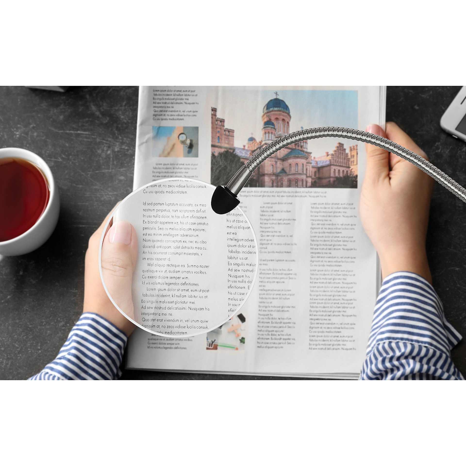 Daylight Flexi Magnifier - in use, reading a magazine