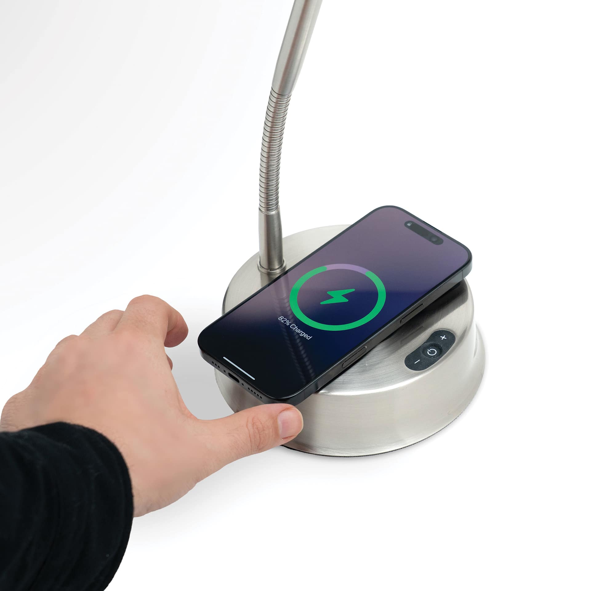 Daylight Libra Table Lamp - phone being placed on charger