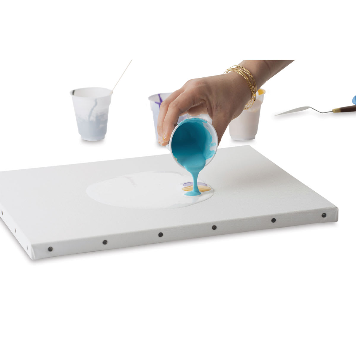 Pebeo Ultimate Pouring Medium (Paint being poured on canvas)