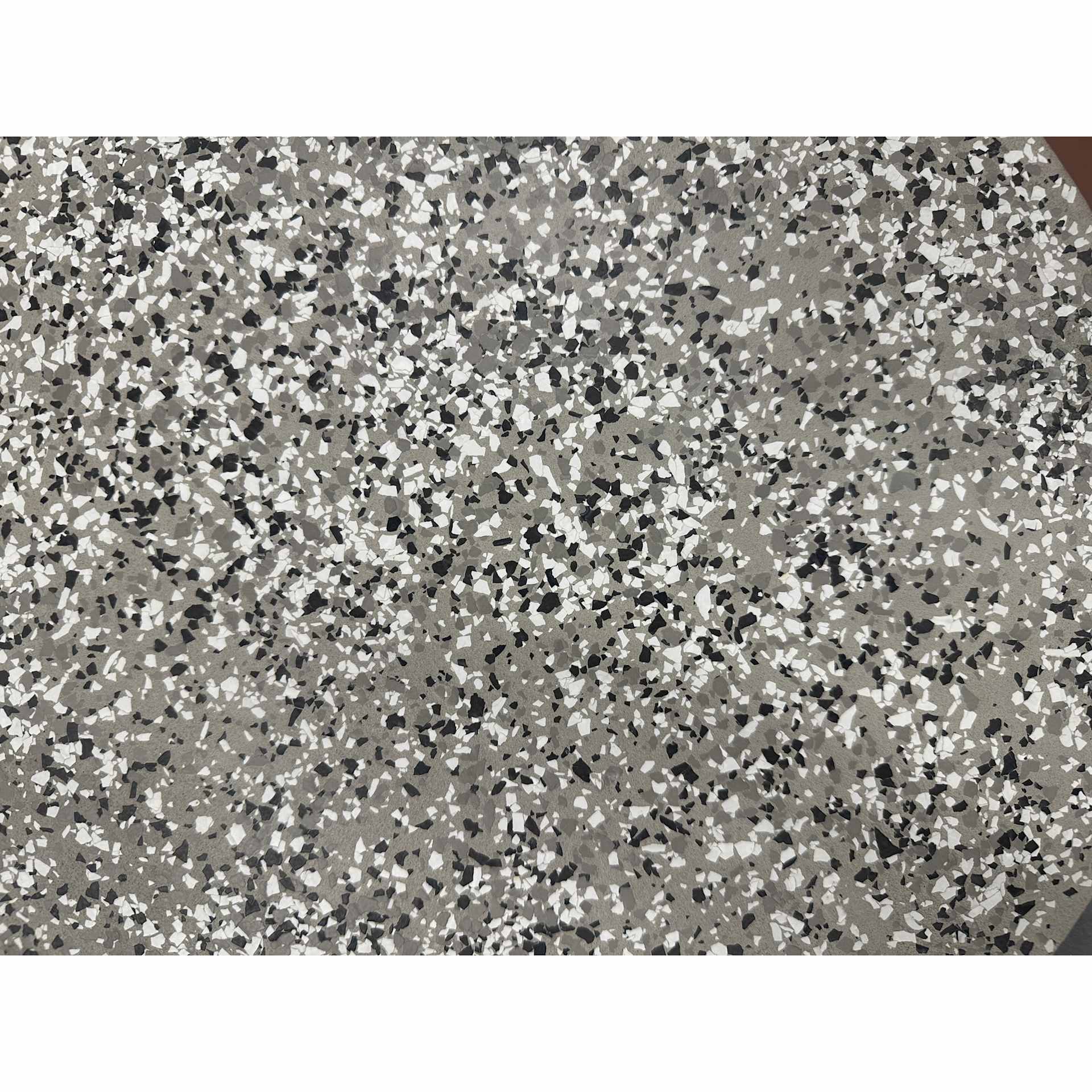 Fleur Terrazzo Effect Flakes applied to a surface.