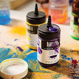 Liquitex Professional Acrylic Gouache bottles on a table