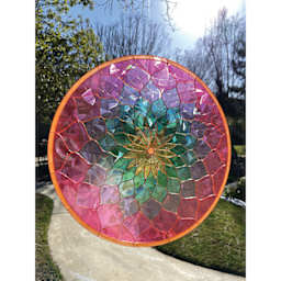 Alumilite Amazing Clear Cast Outdoor Epoxy used on an wall hanging in the sun