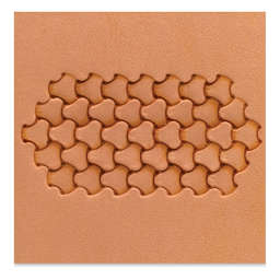 Embossed leather tinted with Realeather One Step Leather Dressing in Saddle Tan
