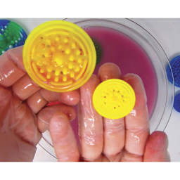 Paint Puck Mini Brush Cleaner -Shown before and after soaking in solvents