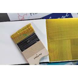 Da Vinci Synthetic Hog Bristle Paddle Brush next to painting