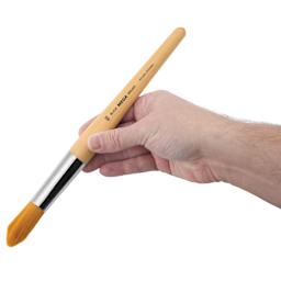 Blick Mega Golden Taklon Brush - Mega Round, Short Handle, Size 40, held in hand