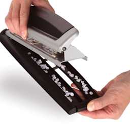 Swingline Precision Pro Desktop Punch with chip tray being removed