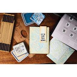 Sizzix Multi Level Textured Impressions Embossing Folder - Vault Flourish, 4-1/2" x 6-1/2" showing completed project