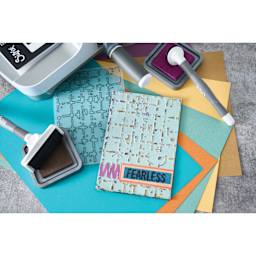 Sizzix Multi Level Textured Impressions Embossing Folder - Grid Graph, 4-1/2" x 6-1/2" showing completed project
