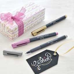Faber-Castell Metallic Markers (used on wrapping paper and a black gift tag)