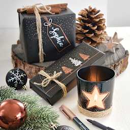 Faber-Castell Metallic Markers (used on black wrapping paper and a glass candle jar)
