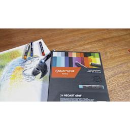 Caran d’Ache Neoart 6901 Pastels - Set of 24, Assorted Colors, on desk