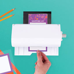 Xyron Creative Station Lite Laminated Adhesive Refill Cartridge inside laminator white laminating