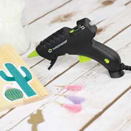 Surebonder Plus Series Mini Dual Temp Glue Gun Kit, glue gun on table